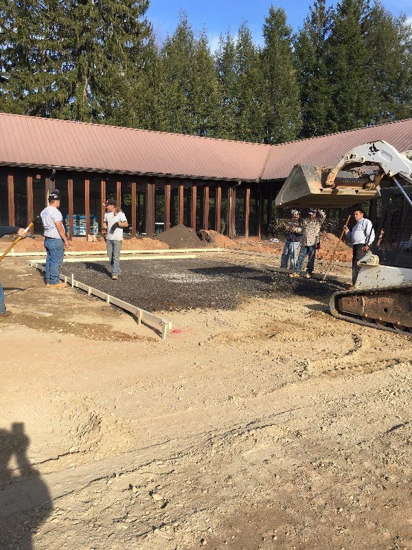 Adding Gravel To The Form — Horseshoe, NC — Carolina Concrete Designs Inc