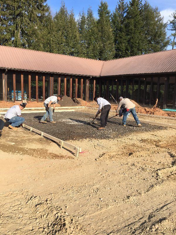 Pouring Gravel To The Form — Horseshoe, NC — Carolina Concrete Designs Inc