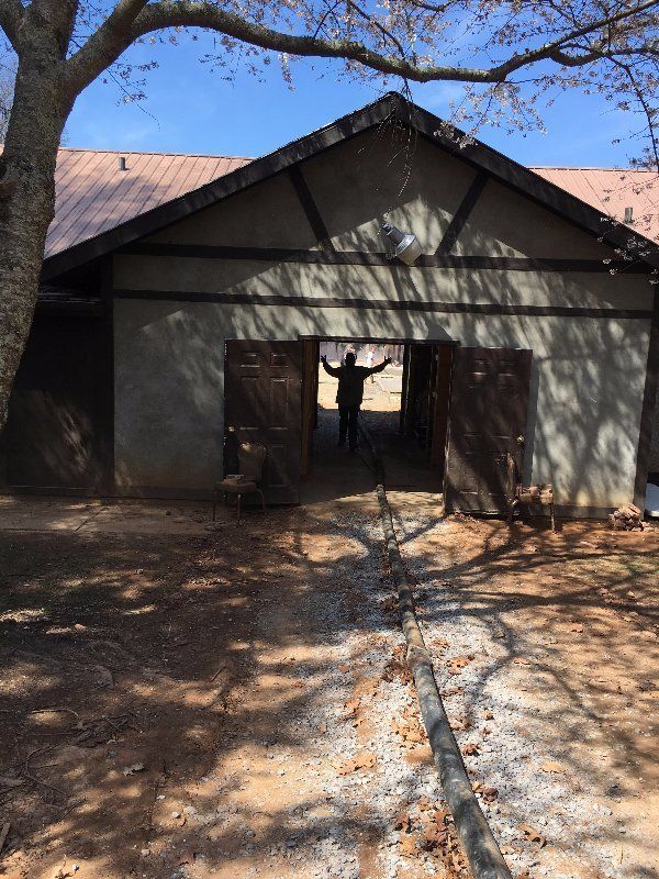 Worker Inside Equipment Room — Horseshoe, NC — Carolina Concrete Designs Inc