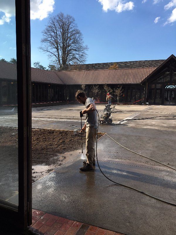 Power Washing The Driveway  — Horseshoe, NC — Carolina Concrete Designs Inc