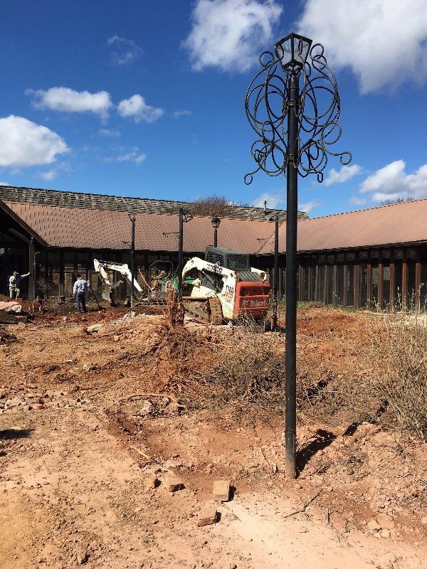 Using Excavator On Deer Park — Horseshoe, NC — Carolina Concrete Designs Inc