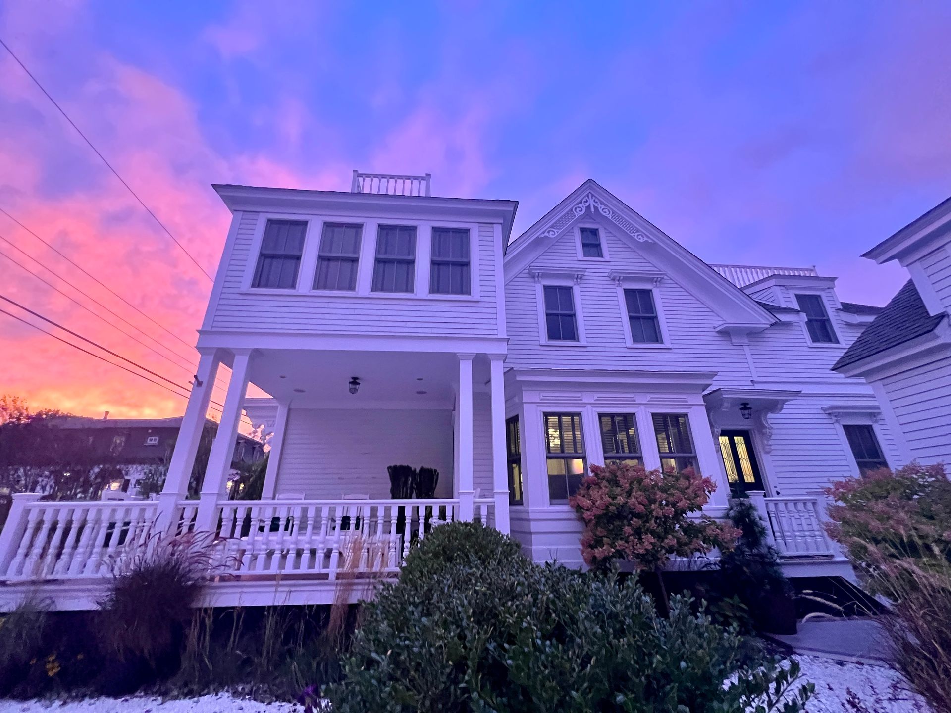 Main House of the White Porch Inn during a very purple dusk: BOOK NOW