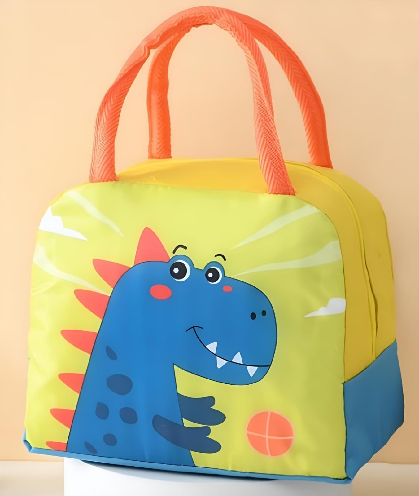 Yellow and blue dinosaur lunch bag with orange handles.