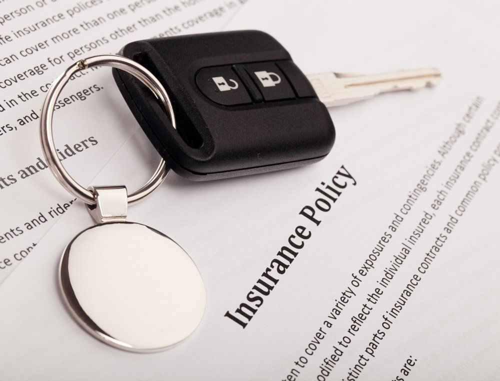 Car Key Above Insurance Paper — Christiansburg, VA — Metro Insurance Services