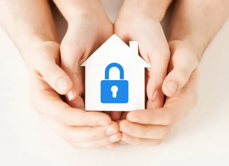 Mother and Child Holding a Miniature House — Southport, QLD — Australian Security Company