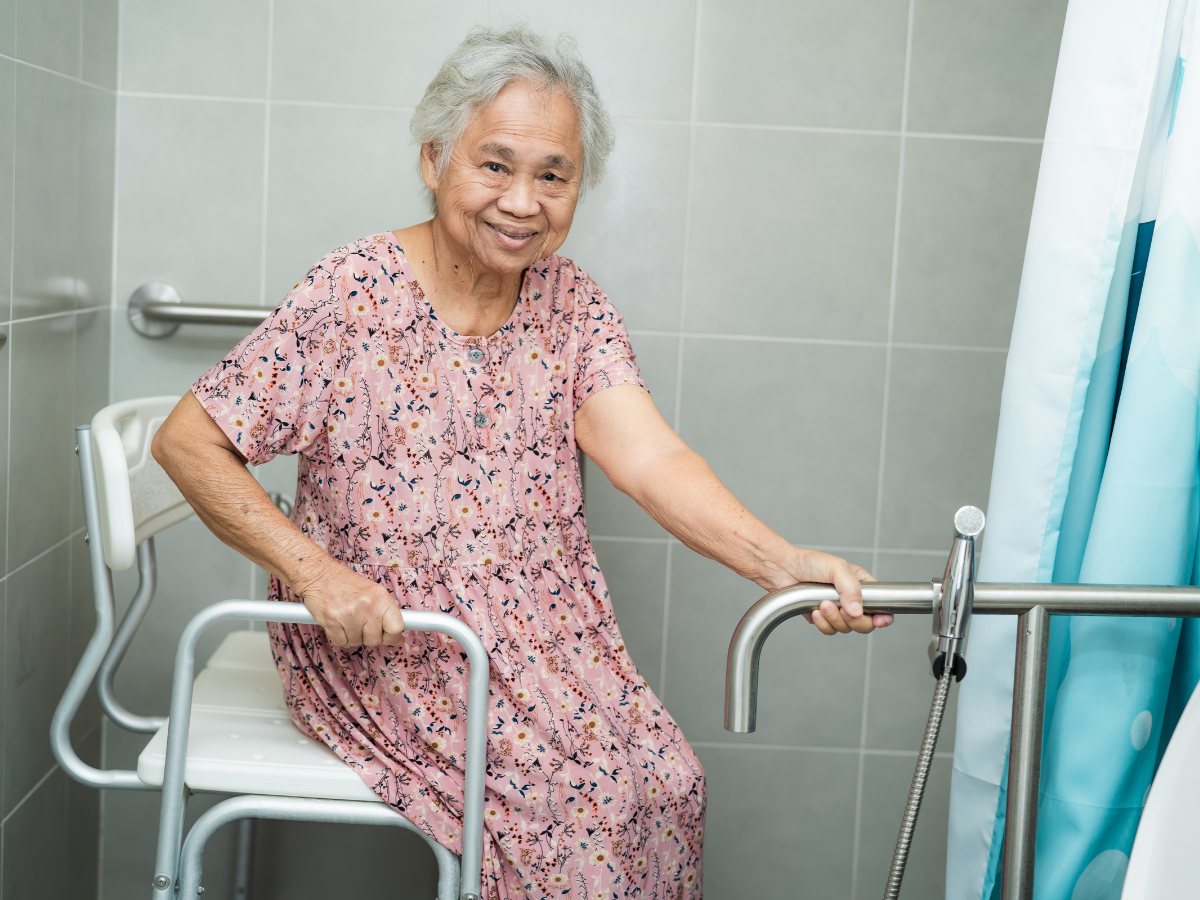 a elderly using a bathroom modification