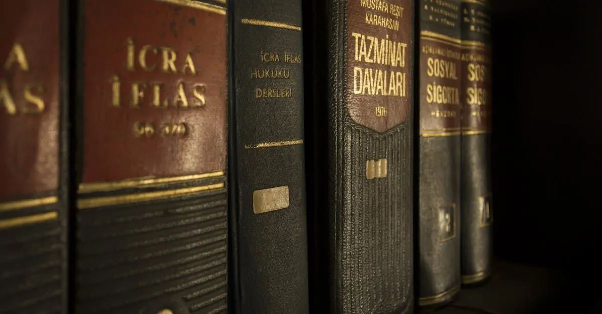 A row of books are lined up on a shelf.