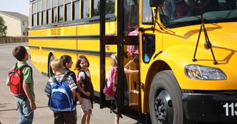 Kids-getting in the bus - DOT compliance