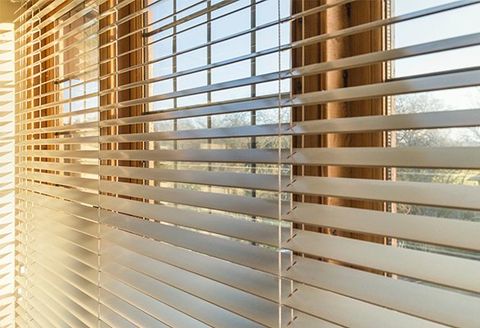 Wood Blinds — Late Afternoon Sunlight Through Blinds in Baton Rouge, LA