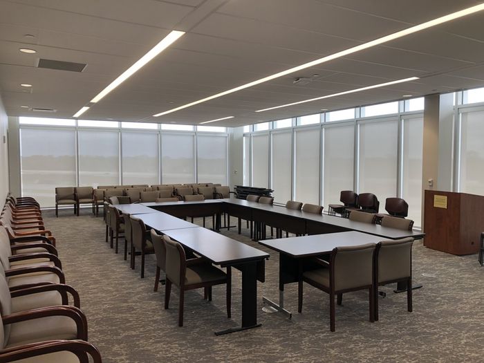 Custom Blinds — Modern Office Interior With Solar Shade in Baton Rouge, LA