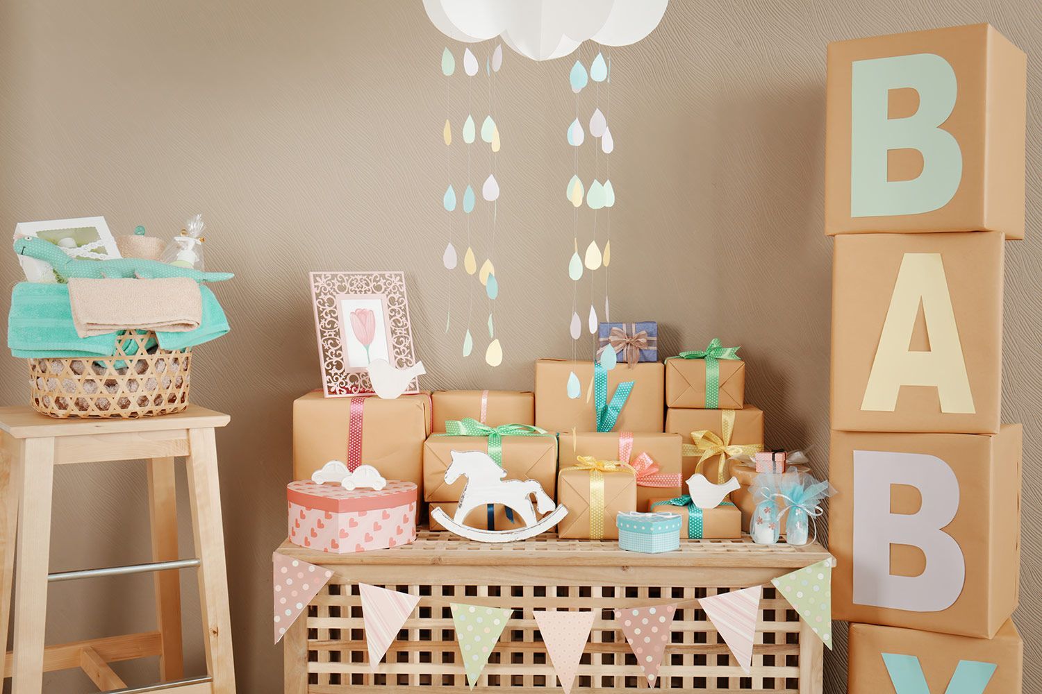Baby shower decorations with stacked gift boxes