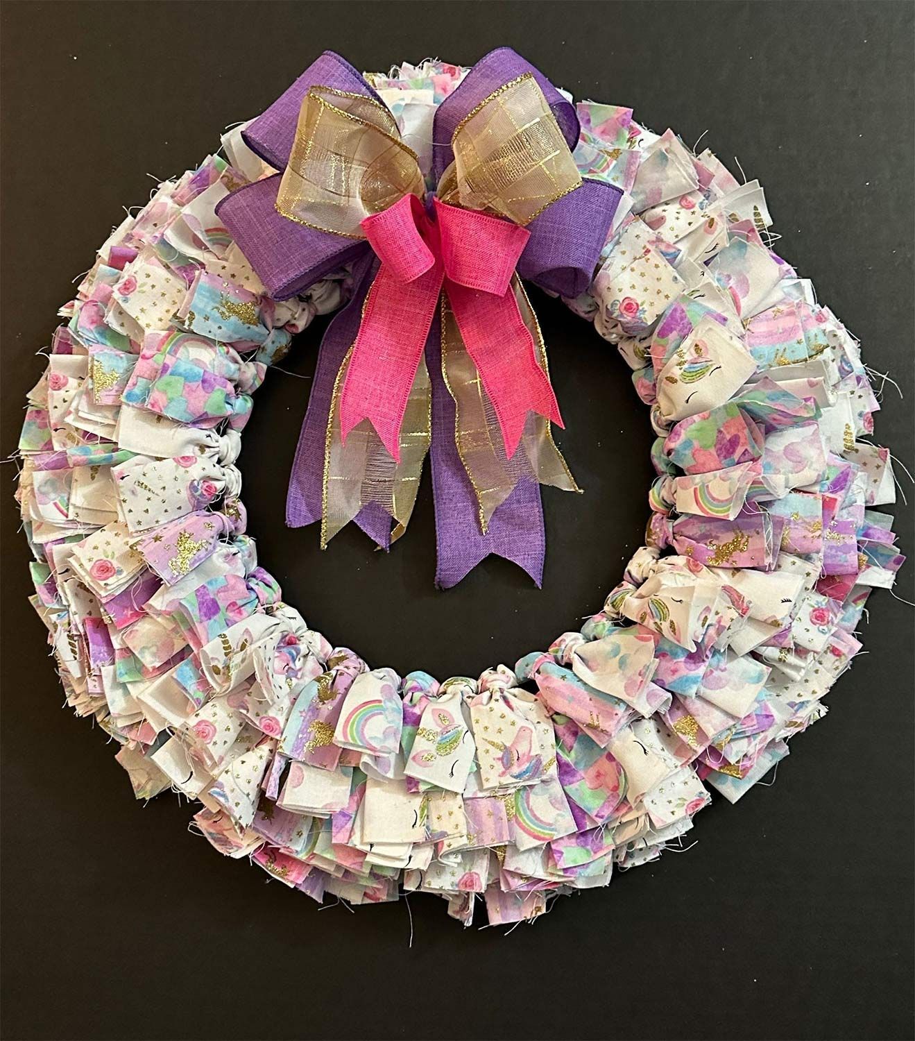 Fabric wreath with pastel floral pattern
