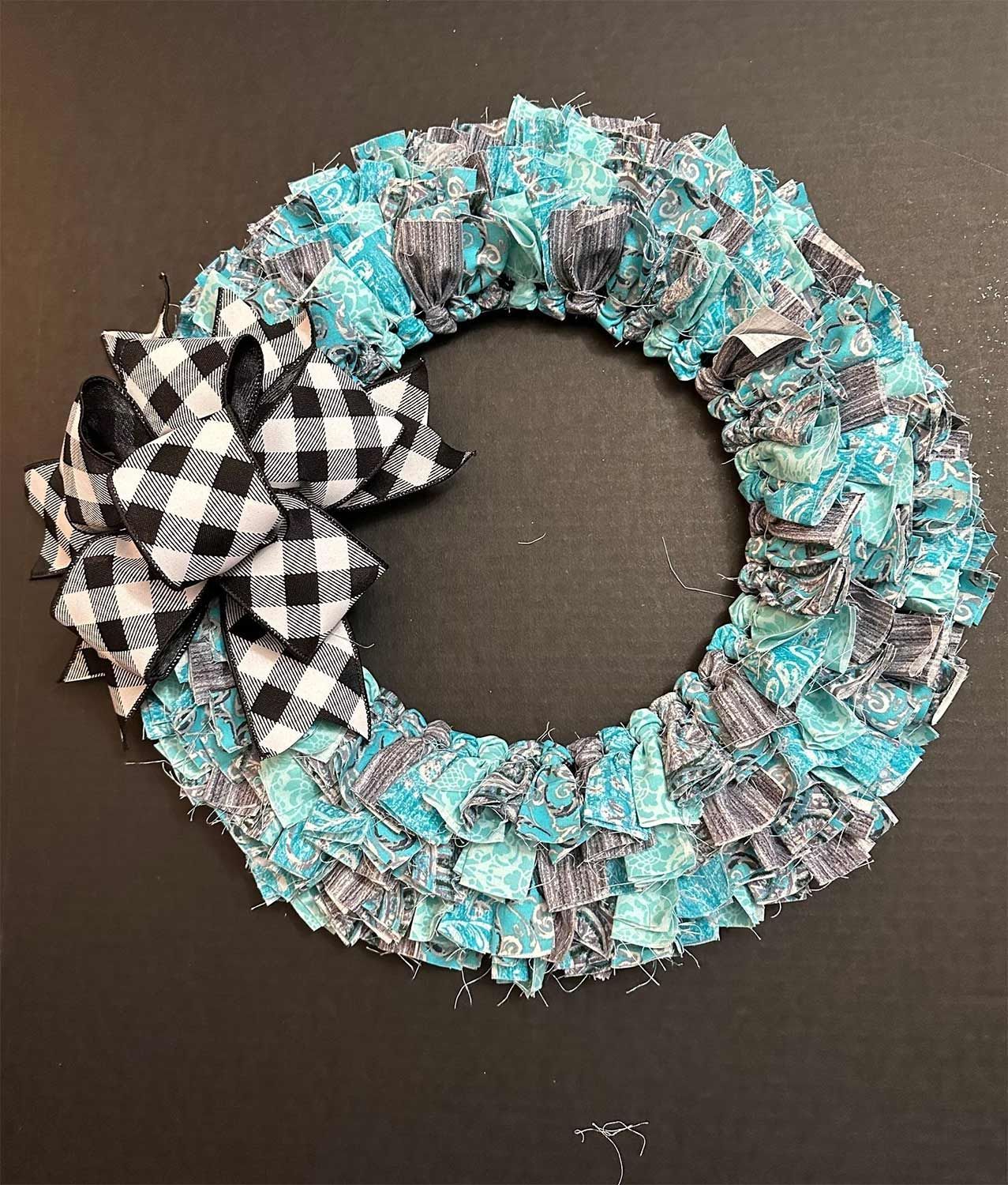 Wreath with blue and gray fabric