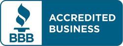 A blue sign that says accredited business on it