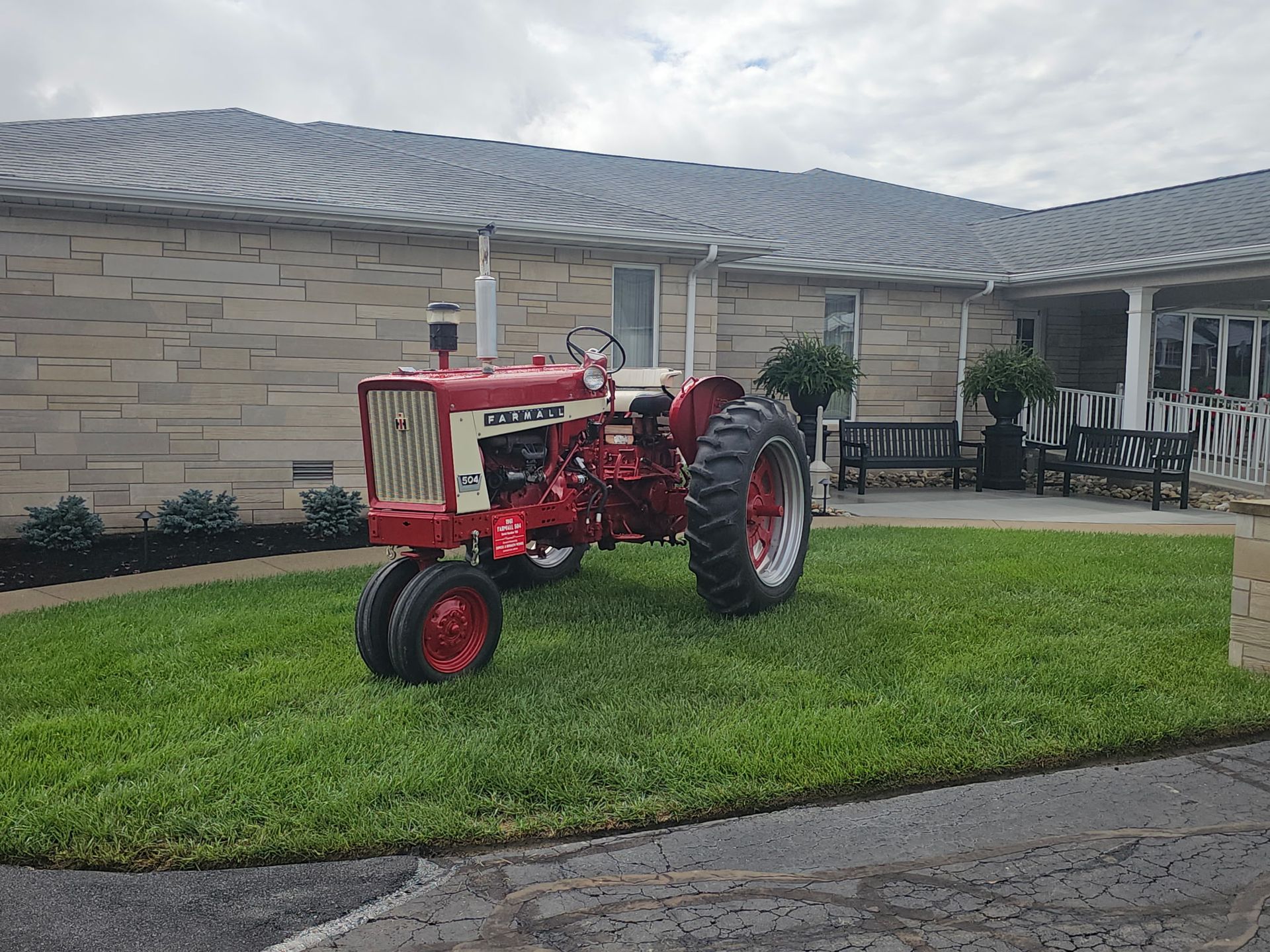 A large brick house with a tower on top of it