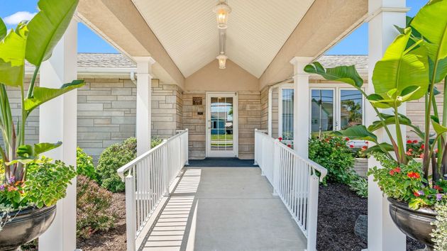Senior couple looking over burial options at HIllside
