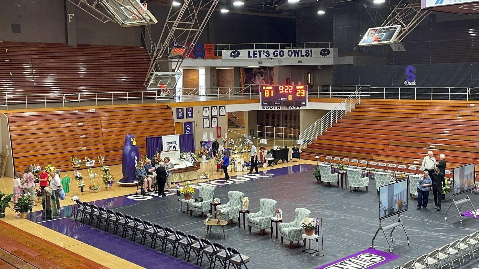 Staff Member shaking hands greeting couple at Hillside