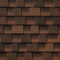 A close up of a roof with hickory shingles.