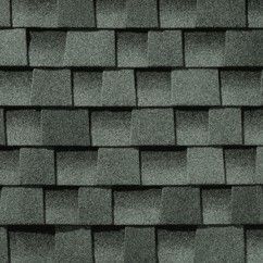 A close up of a roof with shingles on it.