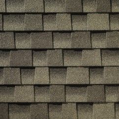 A close up of a roof with shingles on it.