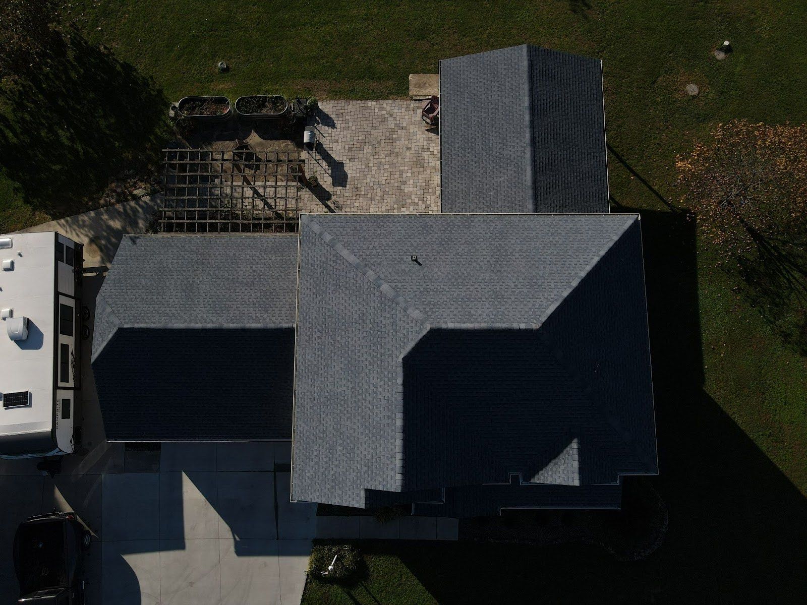 An aerial view of a house with a roof that is being built.