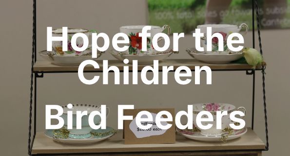 Photo of teacup bird feeders sold to support Hope for the Children