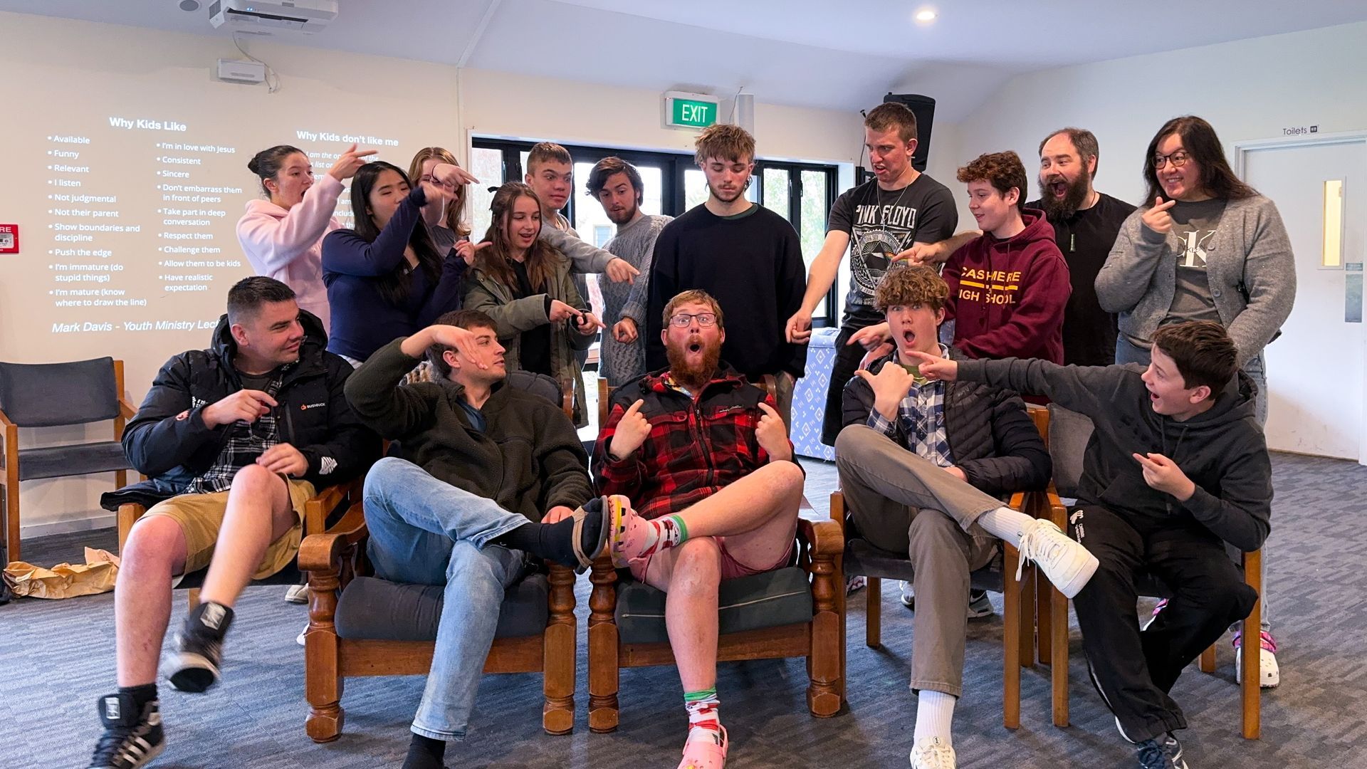 A group of people are posing for a picture together.