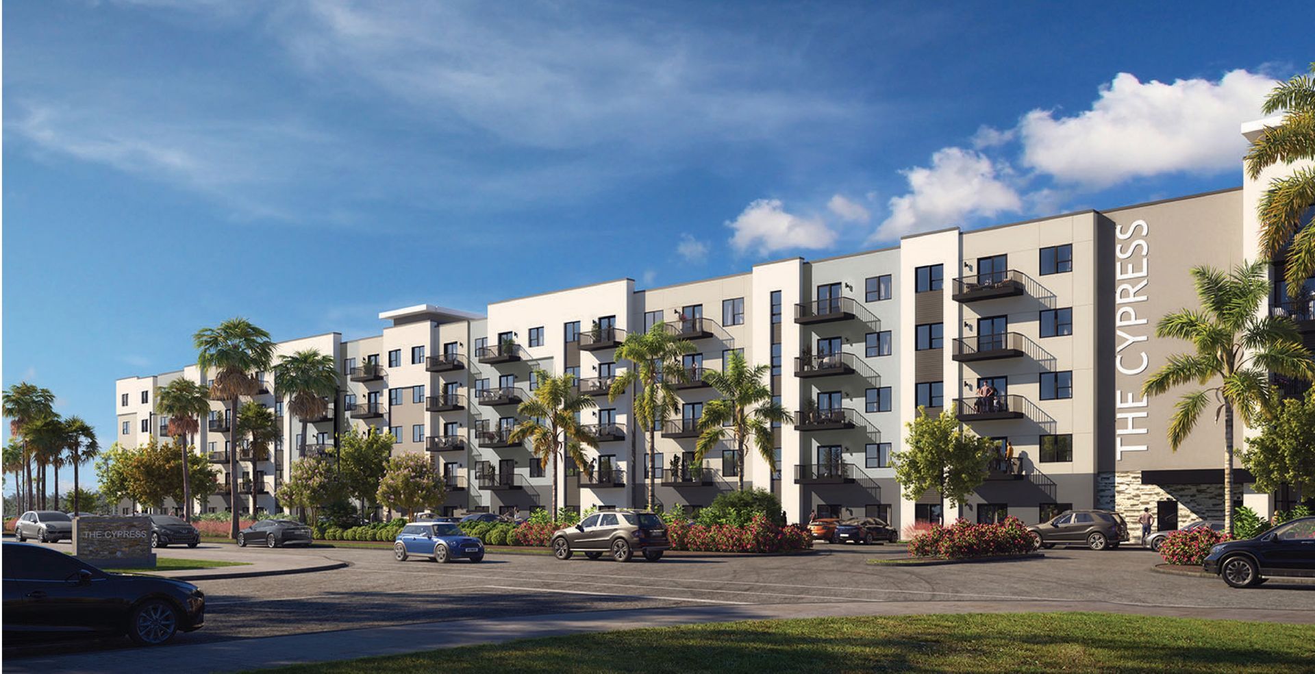 A modern, multi-story apartment building named 