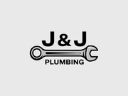 J&J Plumbing logo: black text and wrench over