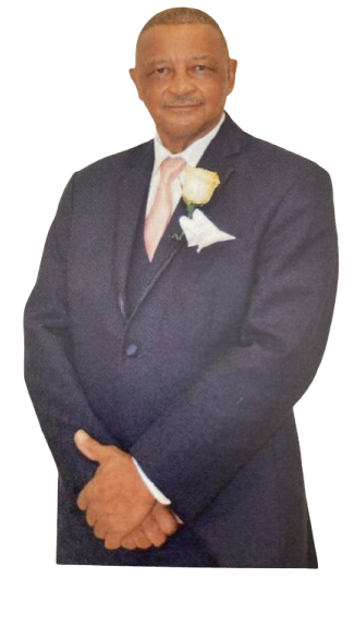 A man in a suit and tie with a flower in his pocket