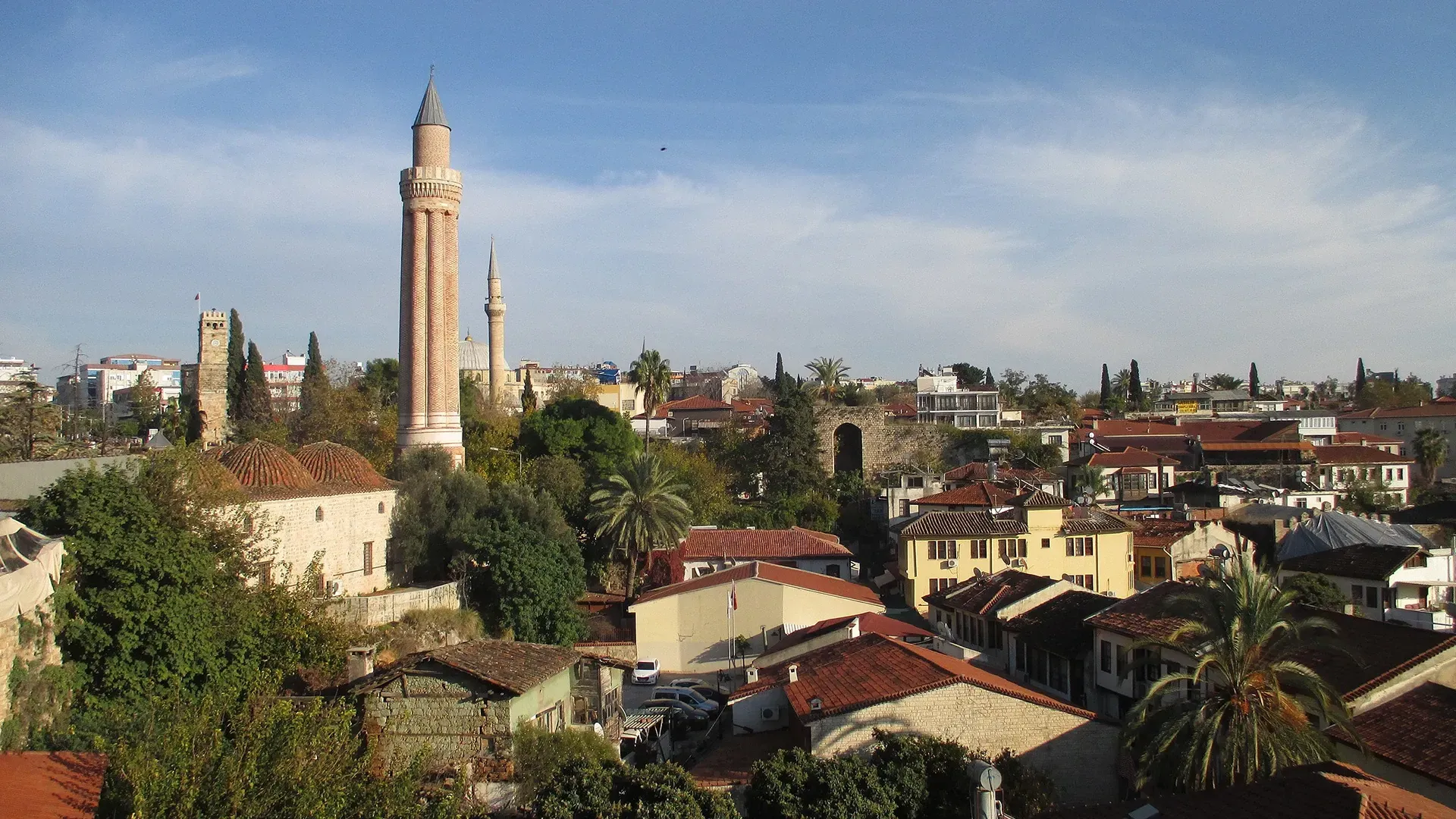 An aerial view of a city skyline with a very tall building in the middle.