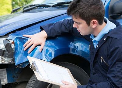 Man Checking a Collision Damage — Hyattsville, MD — New Design Autobody