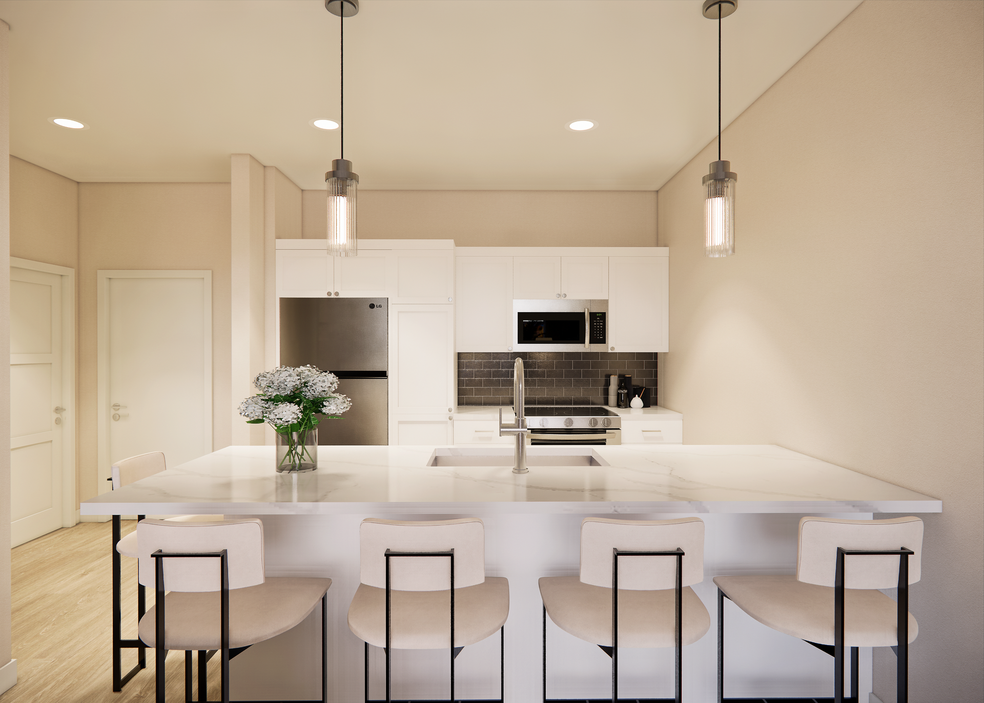 Modern kitchen with white cabinets, island, and bar stools. Stainless steel appliances and light fixtures.