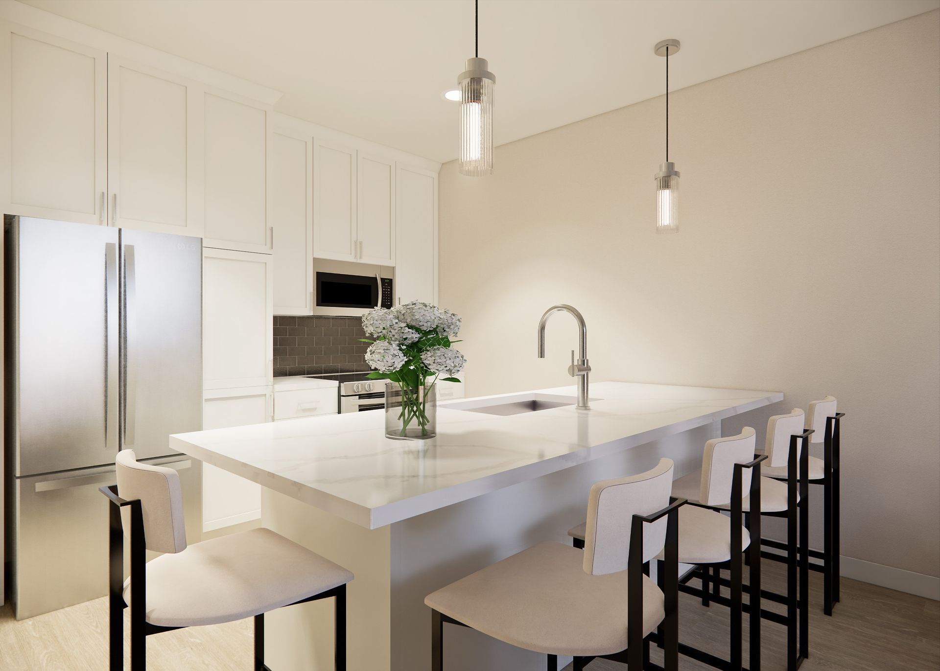 Modern kitchen featuring white cabinets, stainless steel appliances, a marble-top island, and four white stools.