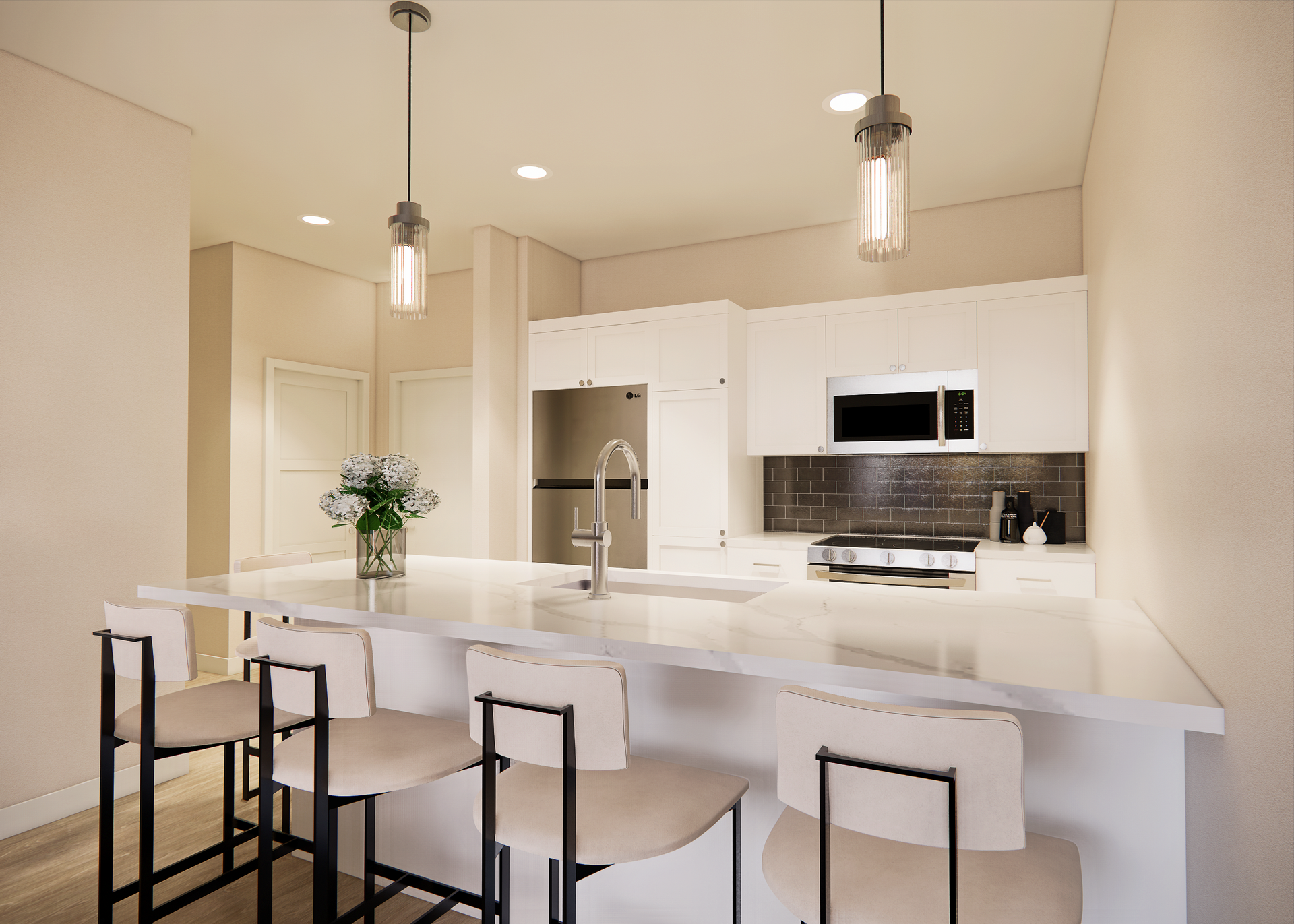 Modern kitchen with white cabinets, island with stools, and pendant lights.