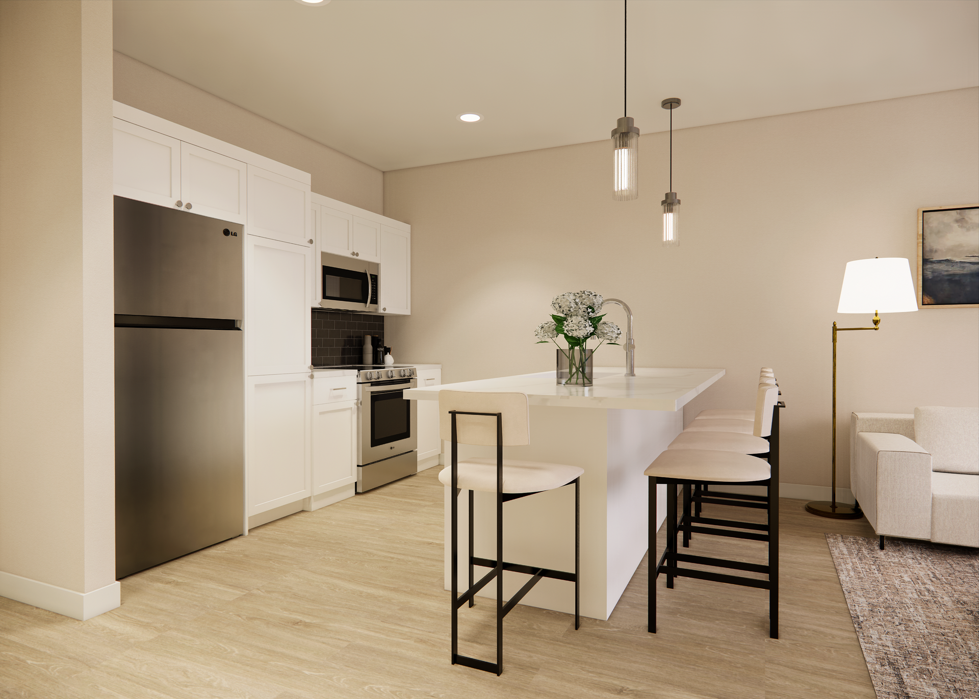 Modern kitchen with white cabinets, stainless steel appliances, island with stools, and light wood flooring.