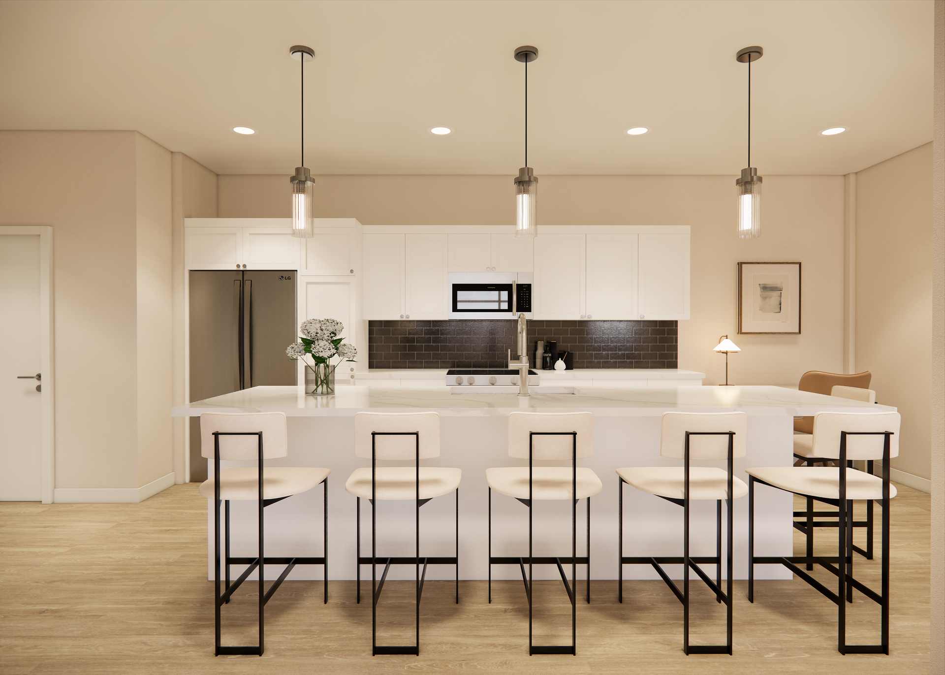 Modern white kitchen with island, pendant lights, and bar stools.