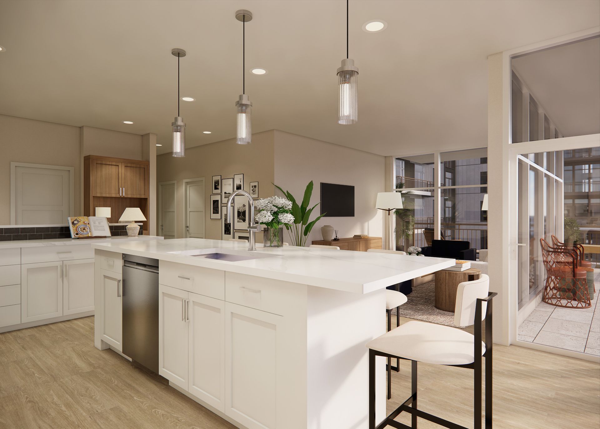 Modern kitchen island with white cabinets, light countertops, and three pendant lights in an open-concept room.