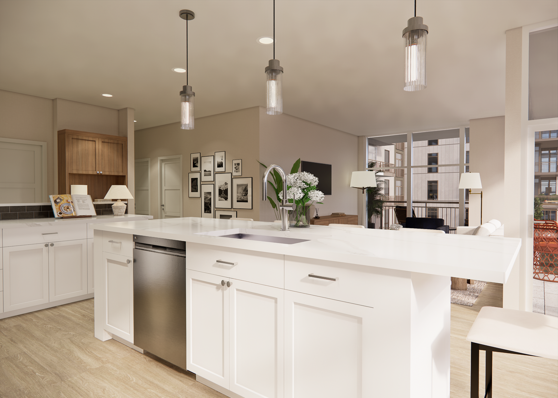Modern kitchen with white island, stainless steel appliances, and pendant lights.