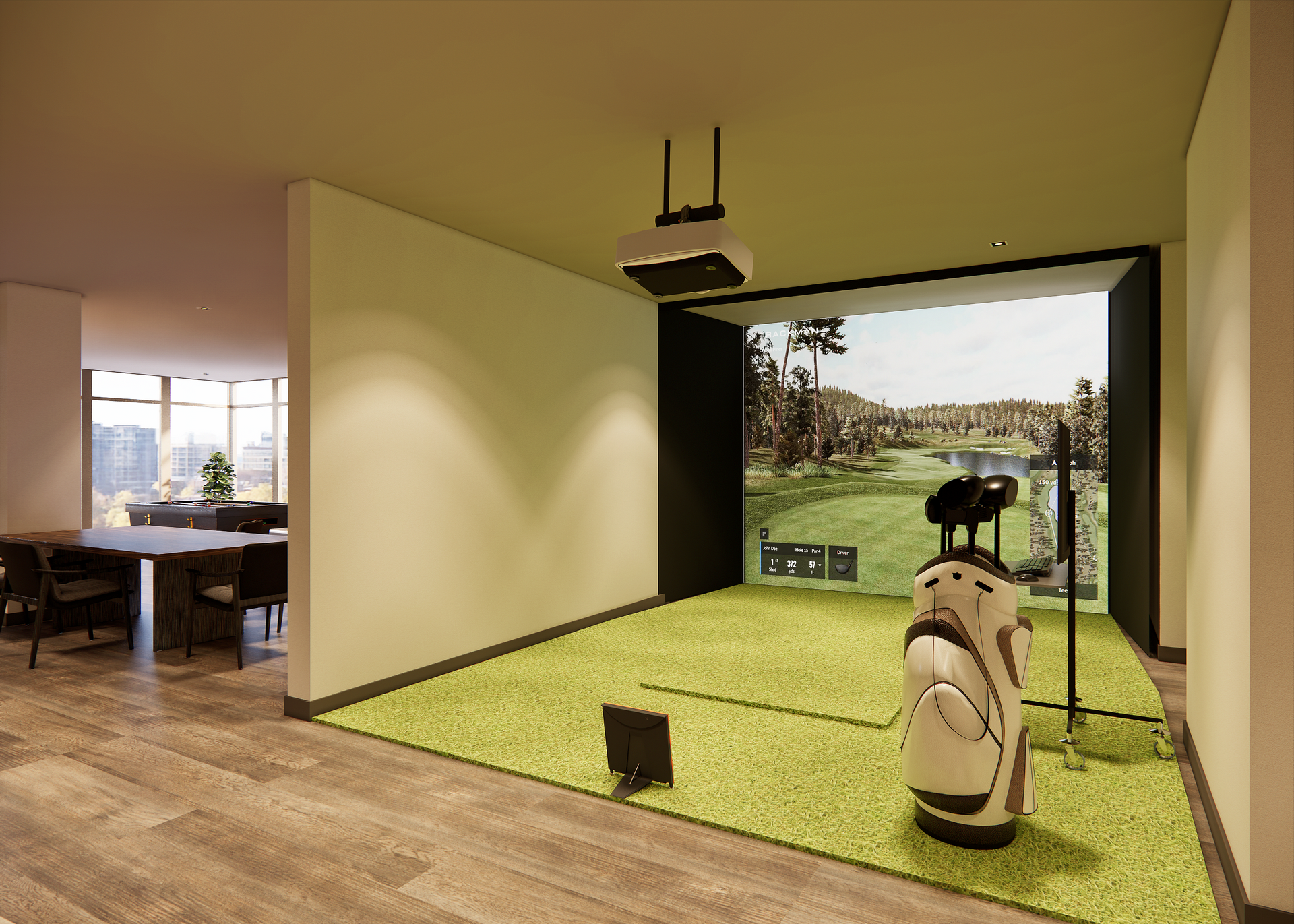 Golf simulator in a room with a green turf floor, screen displaying a golf course, and golf bag.