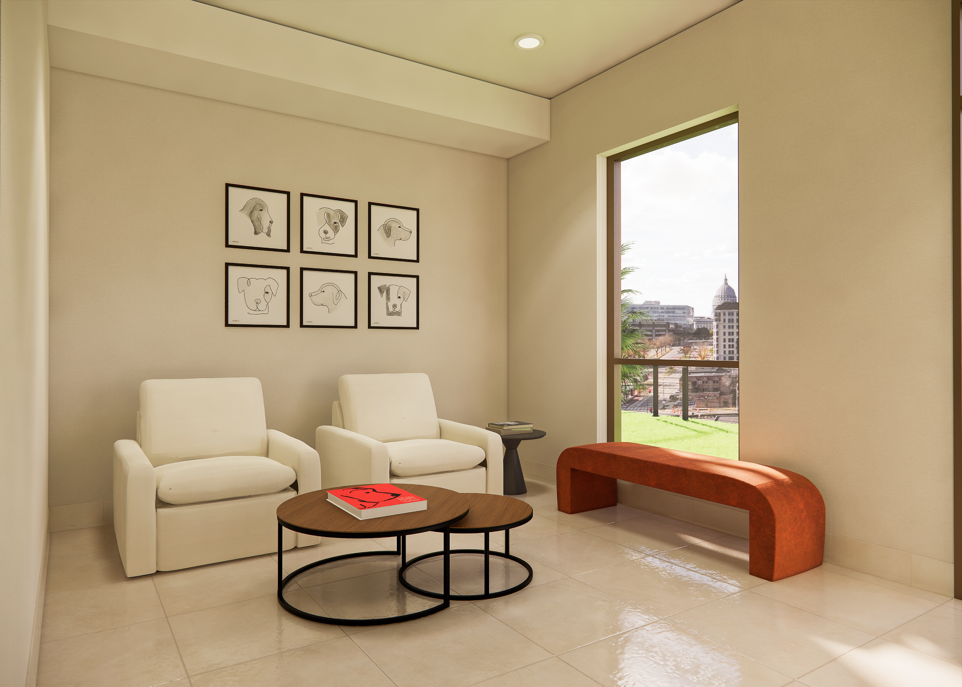 Living room with cream armchairs, a small table, a rust-colored bench, and framed artwork.