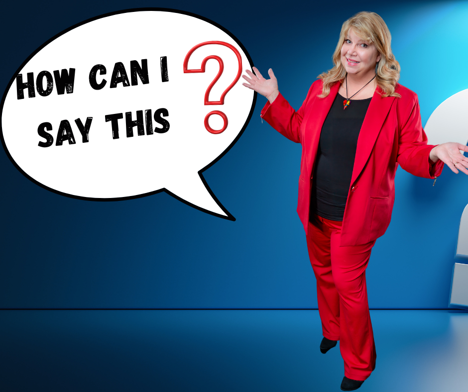 A woman in a red suit stands in front of a speech bubble that says how can i say this