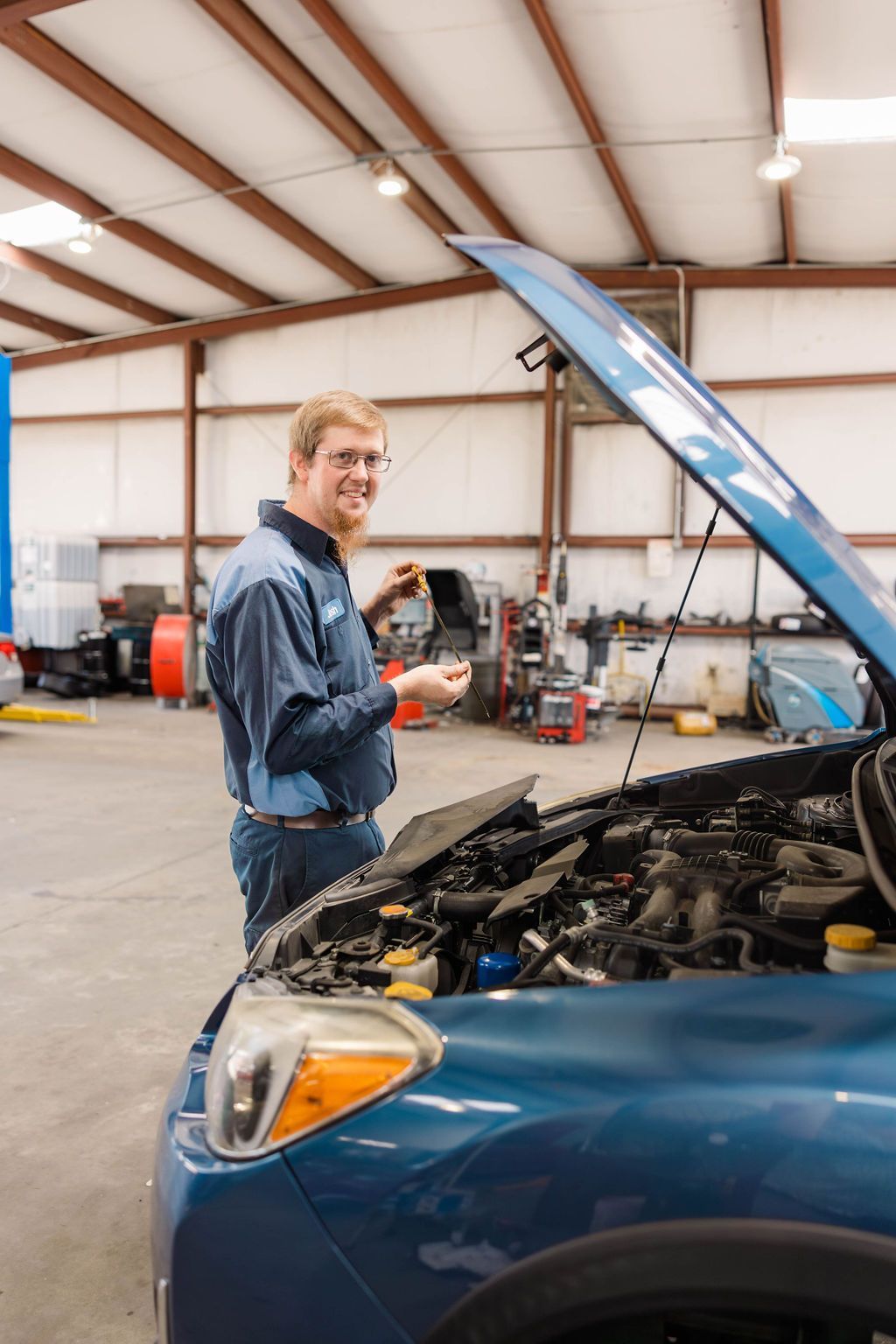 Mechanic working on a car engine | Stephen's Automotive