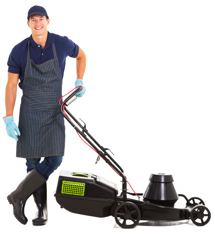 Man wearing apron, gloves, and boots smiles next to lawn mower.