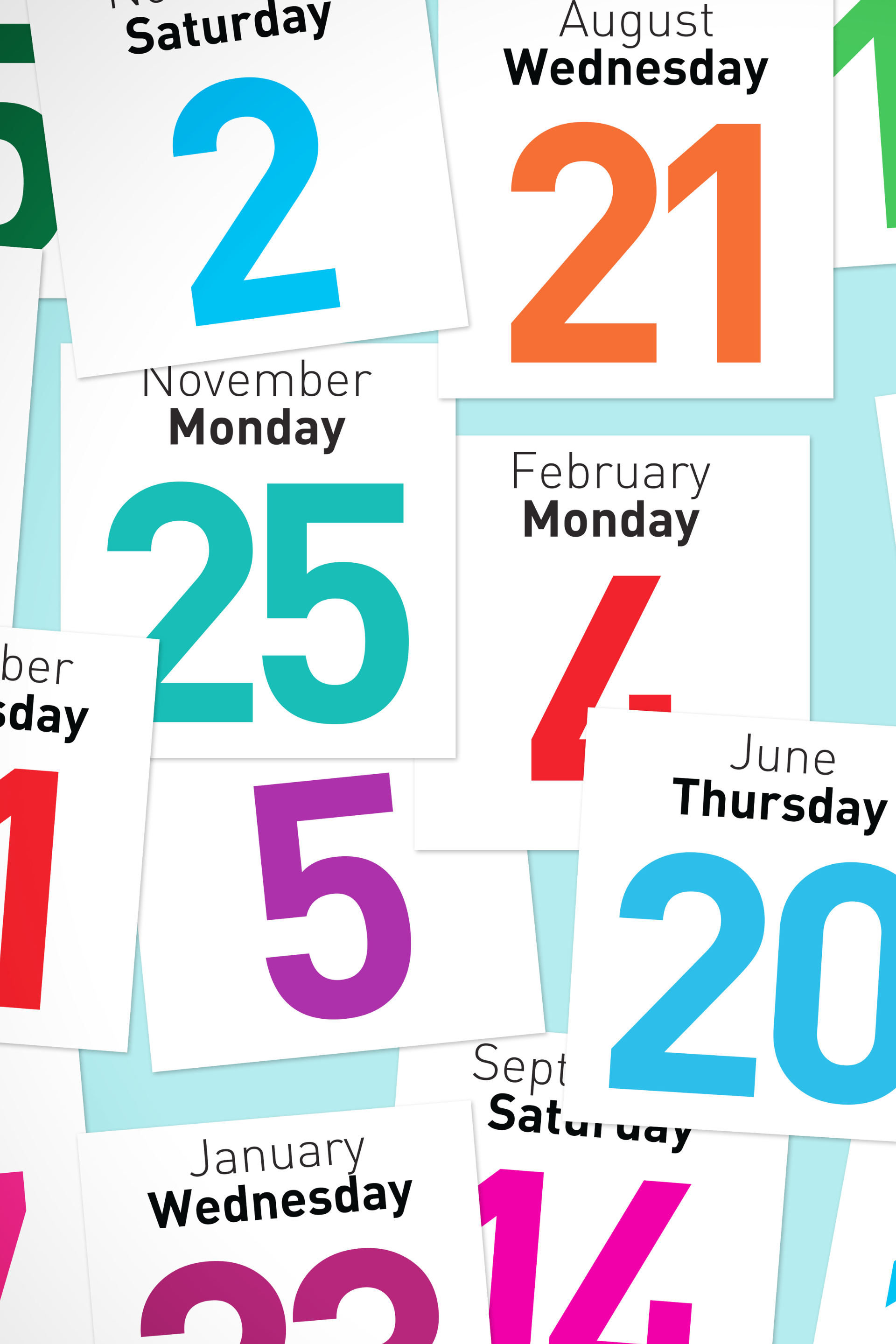 A bunch of calendars with different colored numbers on them