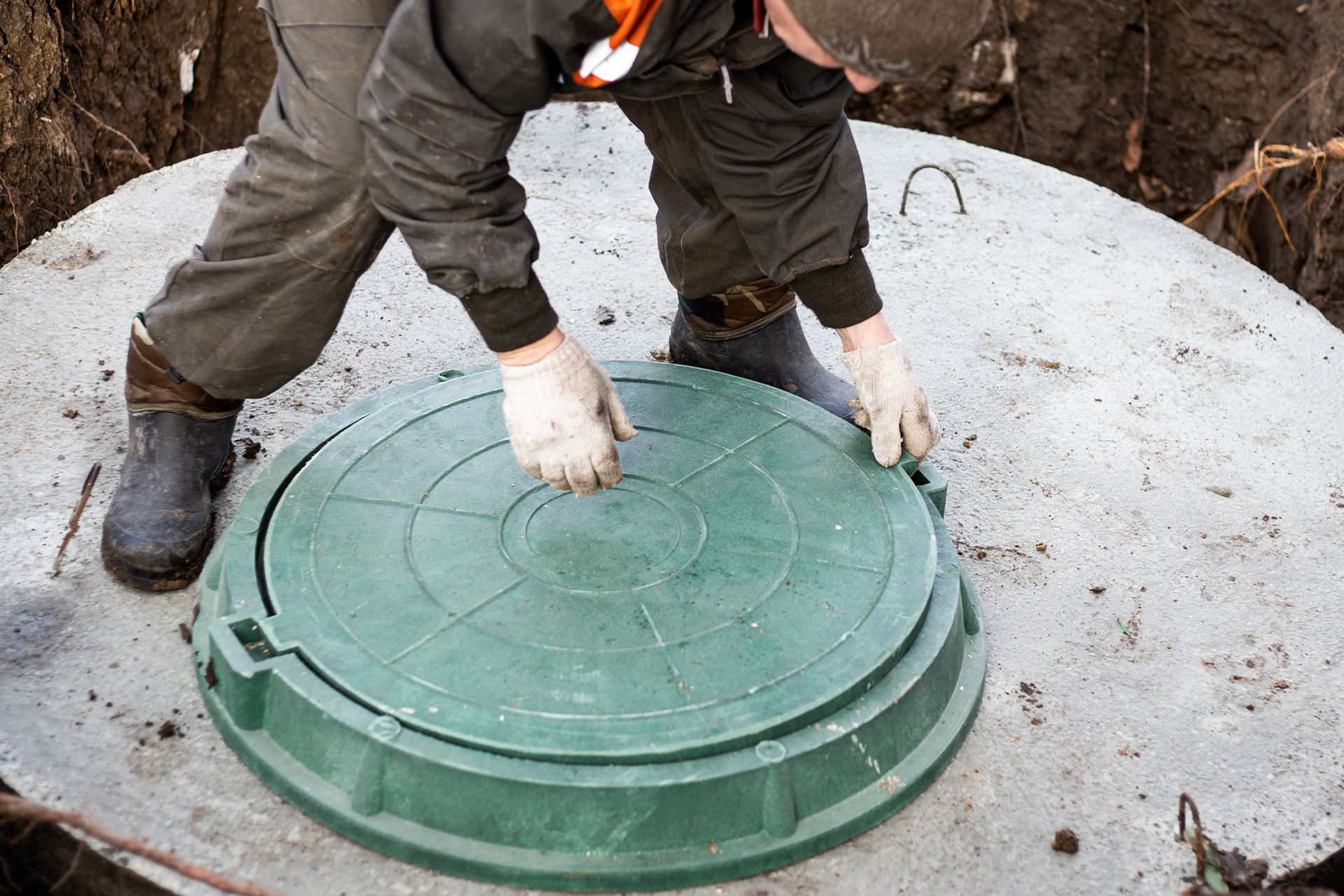 Certified inspector evaluating a septic system