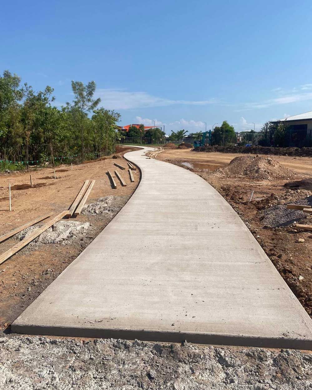 Curved Concrete Road Under Construction — Rural & Commercial Landscaper in Humpty Doo, NT