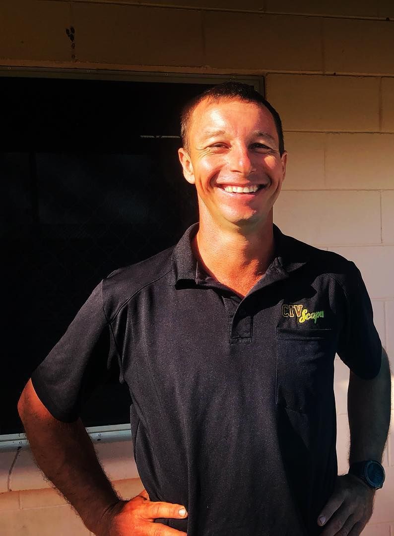 Business Owner Smiling For Photo — Rural & Commercial Landscaper in Humpty Doo, NT
