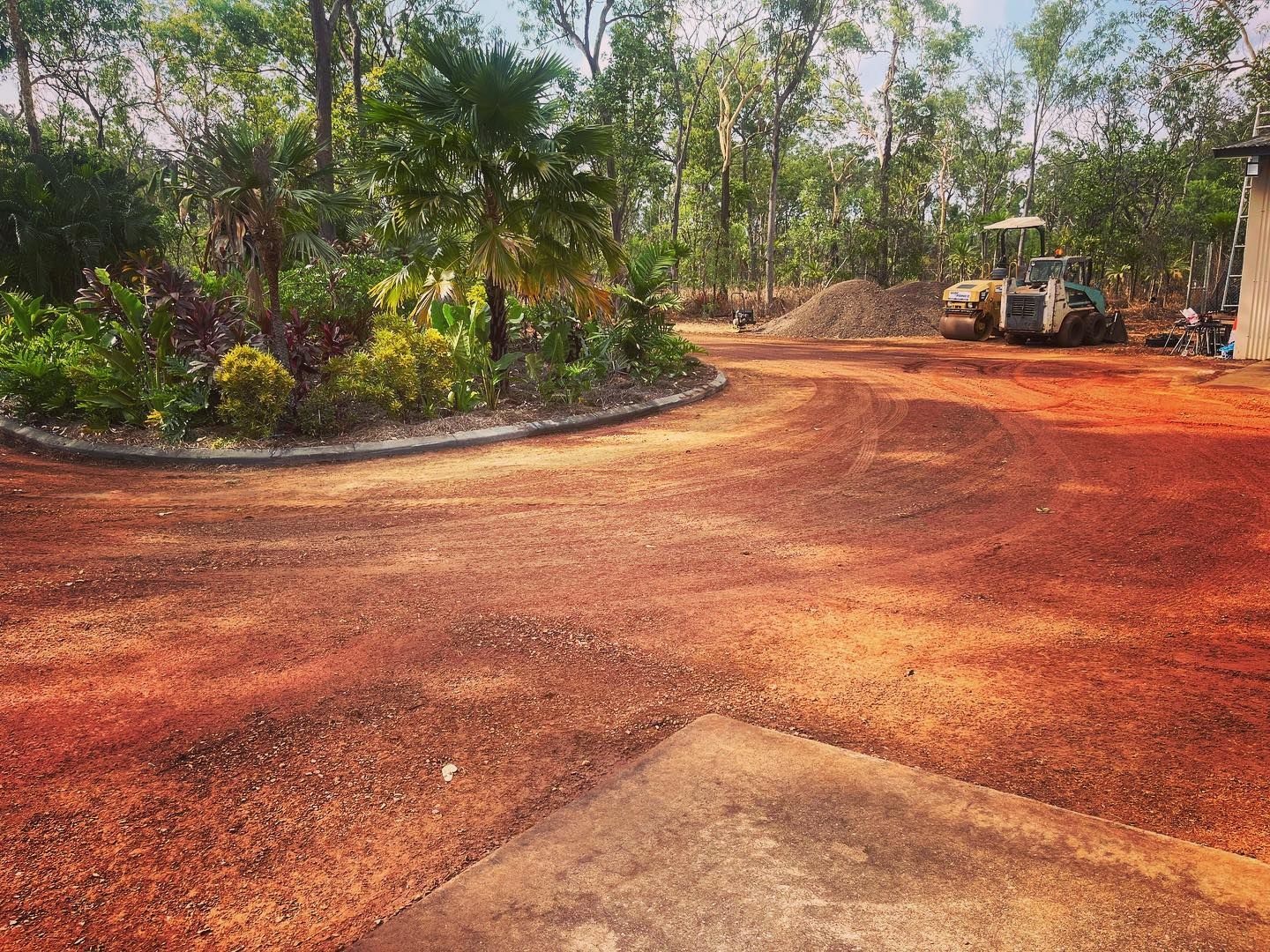 Garden Stone Path With Grass Growing Up Between The Stones — Rural & Commercial Landscaper in Darwin, NT