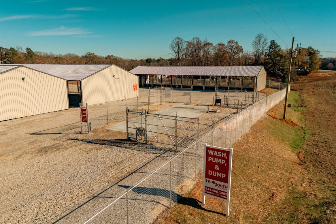 Covered RV Storage with access to wash area, sewage handling, and dumpster